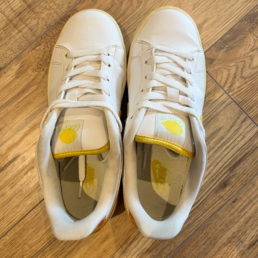 White and Yellow Nike Sneakers